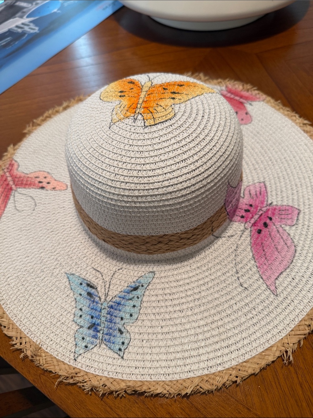 Wide Brim Straw Hat with Colorful Butterfly Accents brand new never worn!!